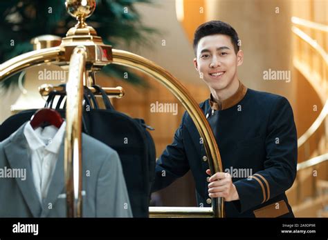 The hotel waiter Stock Photo - Alamy