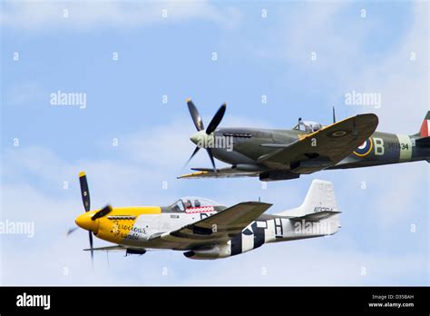 Spitfire and Mustang fighter airplanes in flight Stock Photo - Alamy