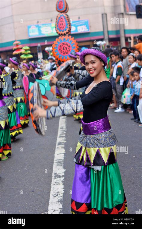 woman with sinulog costume in the sinulog parade Stock Photo - Alamy