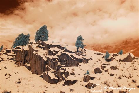 Marcel Huijser Photography | Snow covered rock formation, In super color infrared.