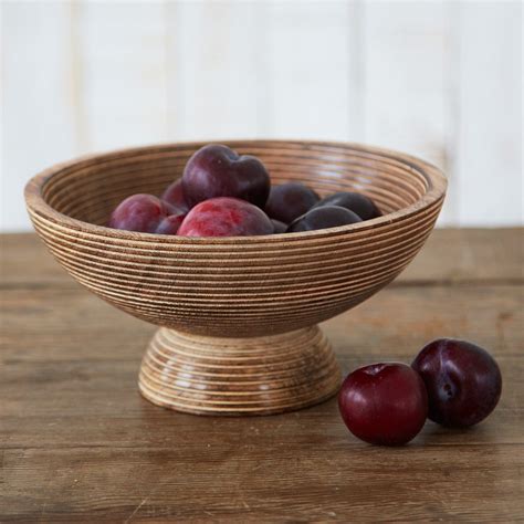 Antique White Carved Mango Wood Bowl The elegant pedestal style bowl has a thin striped design ...