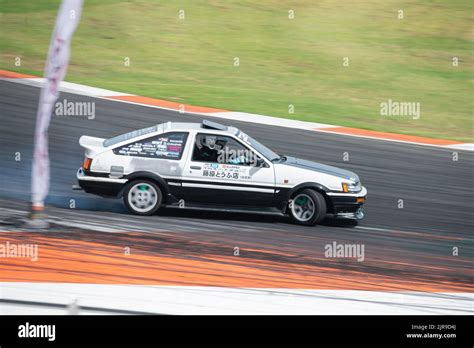 A Toyota Corolla Sprinter Trueno AE86 practicing drifting techniques on the drifting circuit ...