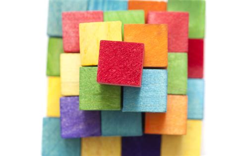 Free Stock Photo 11975 Pyramid Stack of Colorful Wooden Blocks | freeimageslive