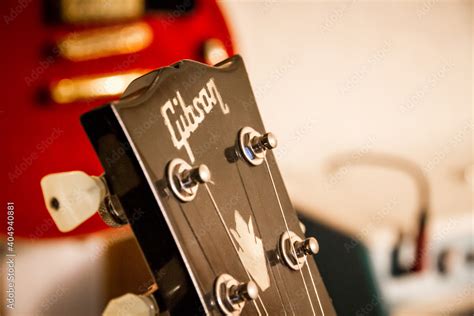 Gibson logo on electric guitar head Stock Photo | Adobe Stock