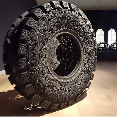 A carved tire | Tire art, Unusual art, Sculpture art