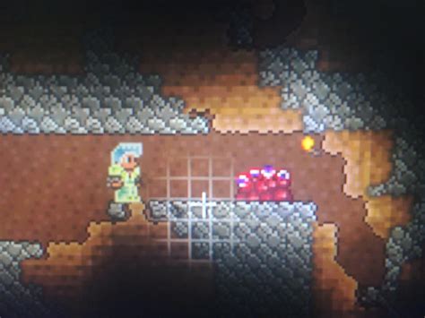 Brand new to Terraria. Found this weird altar thing while mining. What does it do? (I hit it a ...
