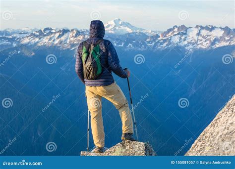 Man on the cliff stock image. Image of climb, hill, hiking - 155081057