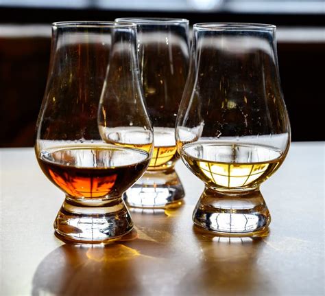 Scotch Whisky, Tasting Glasses with Variety of Single Malts or Blended Whiskey Spirits on ...