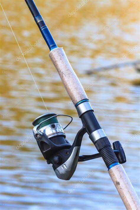 Fishing rods on riverside — Stock Photo © sirichai2514 #62749837