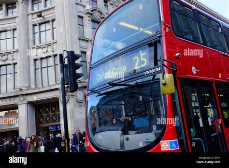 Red London Bus passing through Oxford Circus, London Stock Photo - Alamy