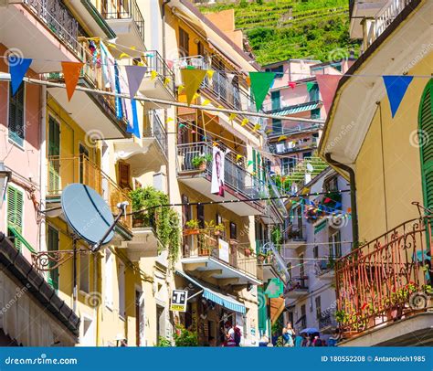 Manarola, Italy, September 12, 2018: Colorful Buildings Houses with Flags Rows, Balconies ...