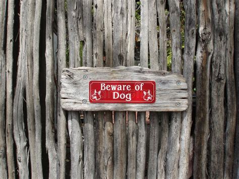 Beware of the Dog Sign Attached To a Timber Fence Stock Image - Image of sign, travel: 180746479