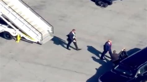 Moment Donald Trump exits plane upon arrival in New York ahead of arraignment