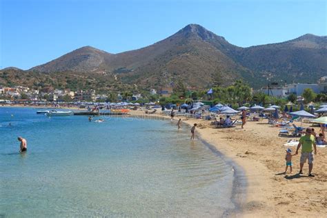 Beach in Elounda editorial photography. Image of sunbathe - 45573287