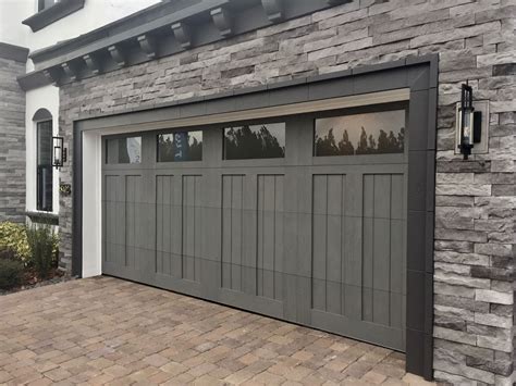 Clopay Canyon Ridge Collection faux wood carriage house garage door, Design 12 with opaque long ...