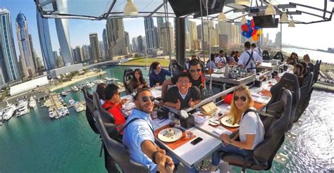 Dubai: Dinner in the Sky at Dubai Marina with Hotel Pickup | GetYourGuide