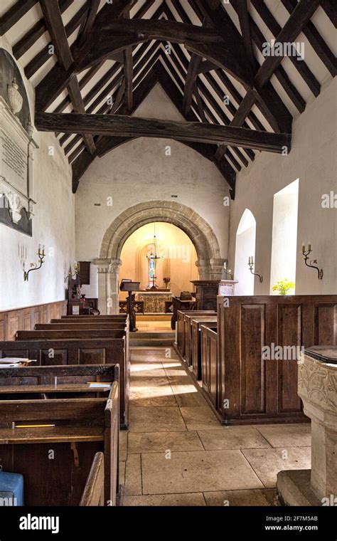 The simple interior of St Michaels church (which dates from Saxon times) in the Cotswold village ...