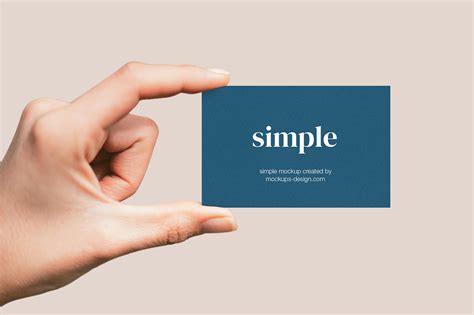 Hand holding business card mockup - Mockups Design