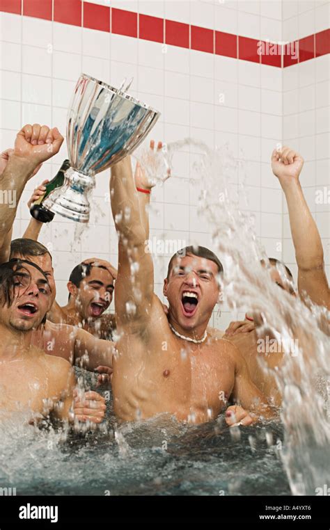 Winning football team in the bath Stock Photo - Alamy