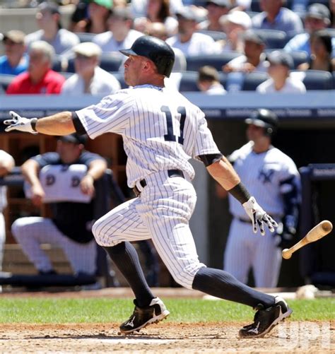 Photo: New York Yankees Brett Gardner hits a grand slam home run at Yankee Stadium in New York ...