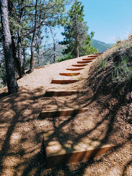 Winding stairs on trail assist you with the ascending terrain.