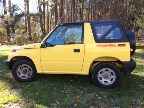 1992 Convertible Geo Tracker 4 WD, Yellow with yellow/black interior ...