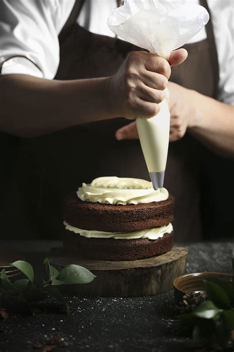 HD wallpaper: person putting cream on chocolate cake, baking, baking ...