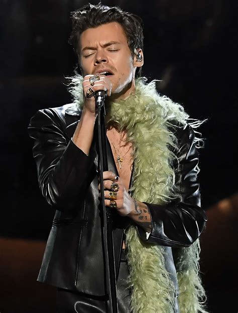 Harry Styles' 2021 Grammys Look — a Leather Suit and Feather Boa — Is 'Adore'-Able