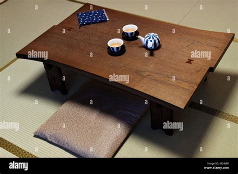 Japanese tea table, Chabudai with a teapot and two cups, Zabuton ...