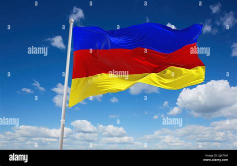 official flag of Galicia and Lodomeria 1849 1890 Austria at cloudy sky background on sunset ...