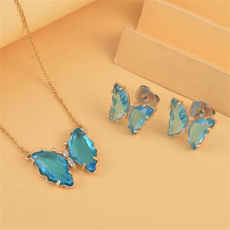 Buy Simulated Sky Blue Topaz and Simulated Diamond Butterfly Earrings ...