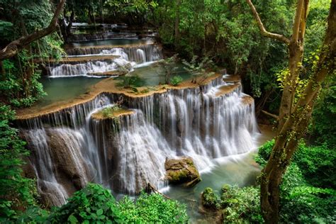 Waterfalls in Kanchanaburi, Thailand. — Stock Photo © aotweerawit #82105510