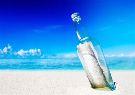 Free Photo | Message in a bottle on beach.