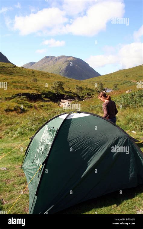 Woman Wild Camping in Scottish Highlands in Scotland in Glen Etive ...