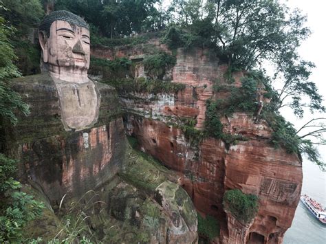 Leshan Giant Buddha Sichuan, China | Landmark statues, Places around the world, Places to go