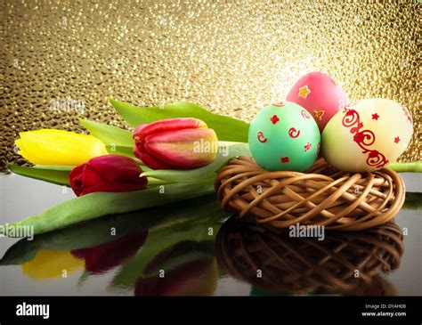 Easter eggs and flowers Stock Photo - Alamy