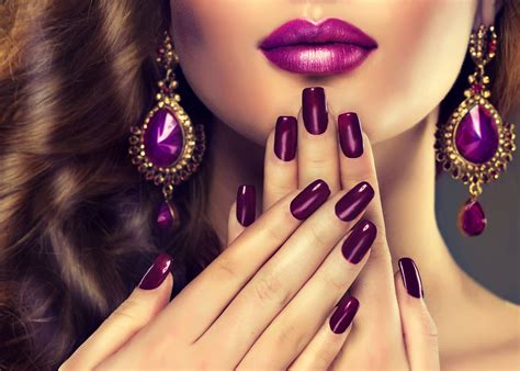 Luxury fashion style, manicure nail , cosmetics and make-up . Jewelry , large purple earrings ...