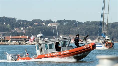 A Coast Guard small boat crew on security patrol during the San ...