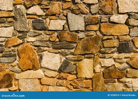 Rust Colored Stone Wall Stock Images - Image: 3258474