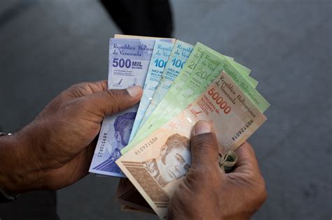 Venezuela to Cut Six Zeroes Off Bolivar to Simplify Transactions - Bloomberg