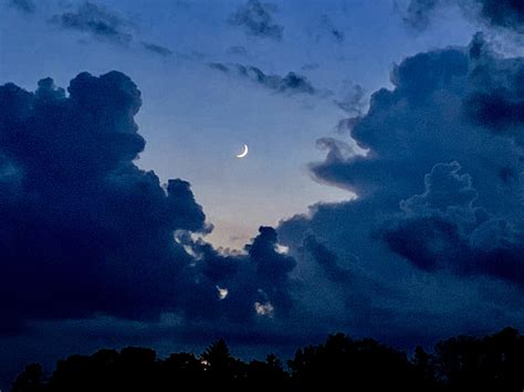 Crescent moon between the thunderheads. | Sky aesthetic, Asian ...