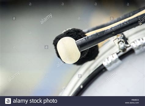 Several drumsticks mounted on a bass drum for different percussion ...