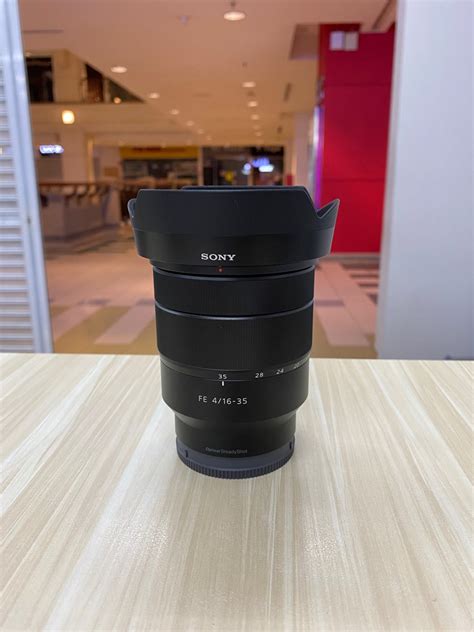 SONY ZEISS FE 16-35MM F4 ZA OSS LENS (99% NEW), Photography, Lens & Kits on Carousell