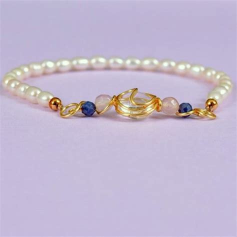 A bracelet for Cancers made of pearl, quartz, sapphire and rose quartz.|The Summit Lighthouse ...