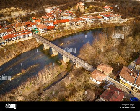 Aerial view of Impressive overhead view of the old stone bridge across ...