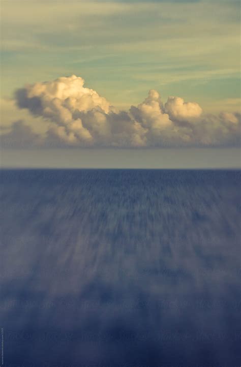 "Blue Ocean Horizon With Clouds" by Stocksy Contributor "SKC" - Stocksy