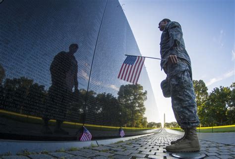 Soldier reflects and Vietnam Memorial wall | Article | The United States Army