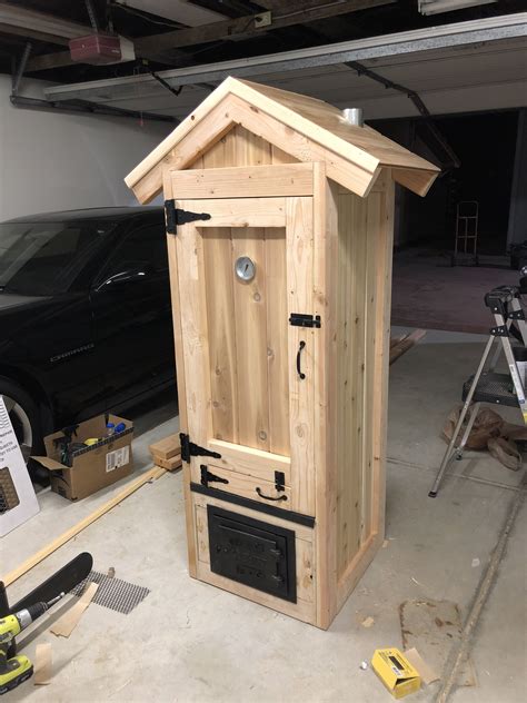 Homemade smokehouse. DIY smoker built with a bypass firebox, 5 racks. Cedar for … in 2020 (With ...