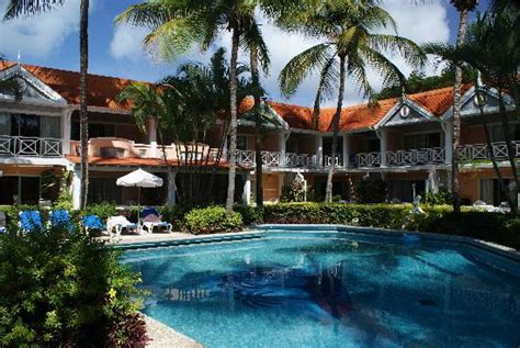 Sunset and a cocktail.. Perfect !!! - Picture of Coco Reef Resort & Spa Tobago, Crown Point ...