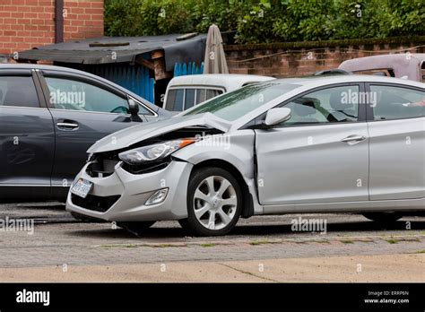 Car with front end collision damage - USA Stock Photo - Alamy